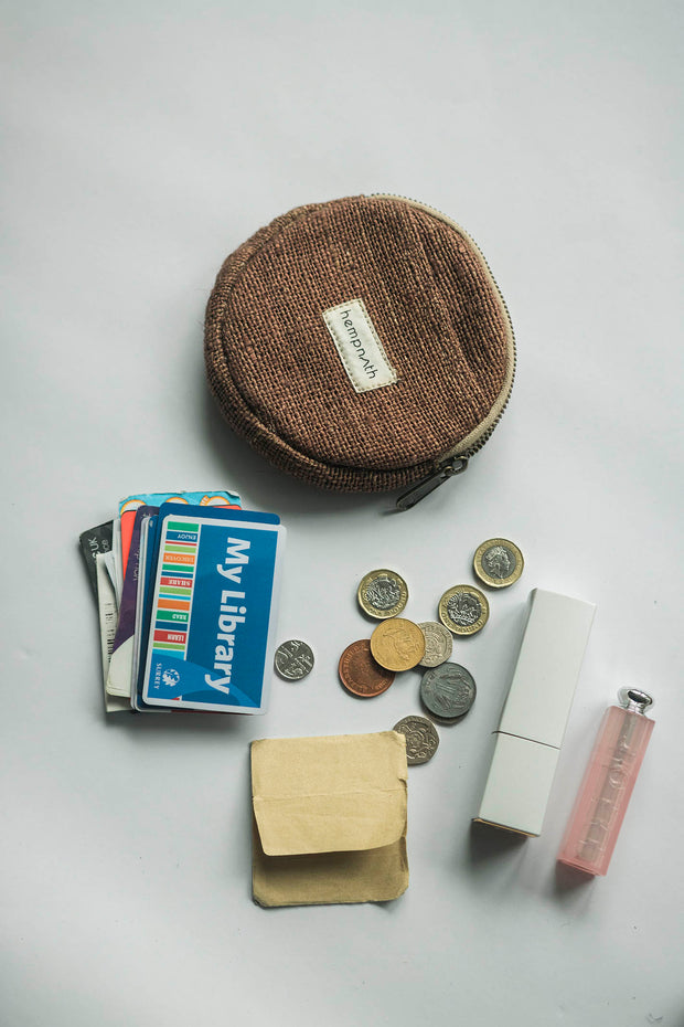 Top view of the handmade Coin Purse in Brown, illustrating the spacious main compartment and what can fit inside