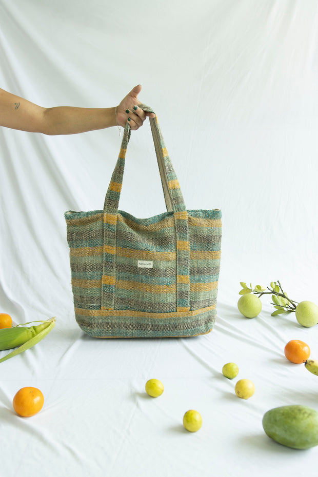 Handmade hemp tote bag with earthy tones, perfect for sustainable fashion.