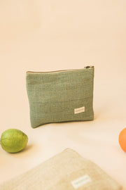 Minimalist green hemp pouch perfect as a toiletry bag for natural travel