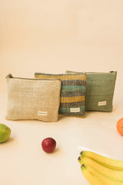 Collection of natural hemp pouches in different sizes with fruit props