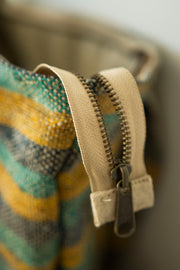 Close-up of zipper and stitching on the natural hemp tote, highlighting its secure and functional design.