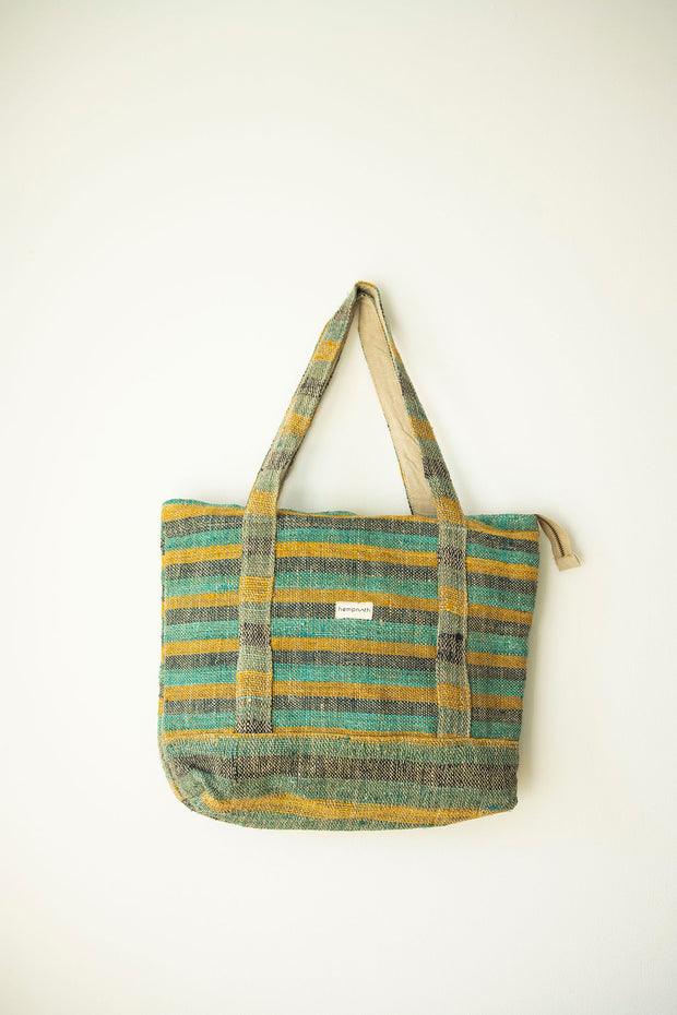 Front view of the large tote bag, made from colorful handwoven hemp fabric