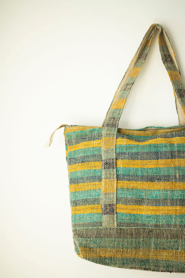 Side profile of the large hemp tote showing depth and capacity for all your essentials