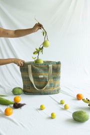 Handmade hemp tote bag with earthy tones, perfect for sustainable fashion.