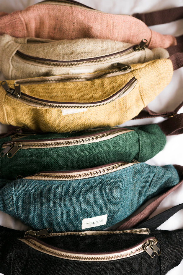 hemp bum bags in white, pink, green, black and mustard. All ethically made in Nepal