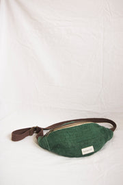 A rich forest green hemp waist bag, blending eco-conscious materials with a stylish and functional design.