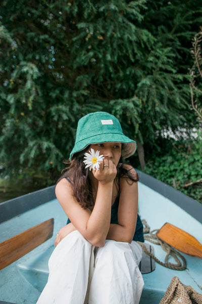 Eco-friendly hemp bucket hat in green, perfect for sun protection and outdoor activities